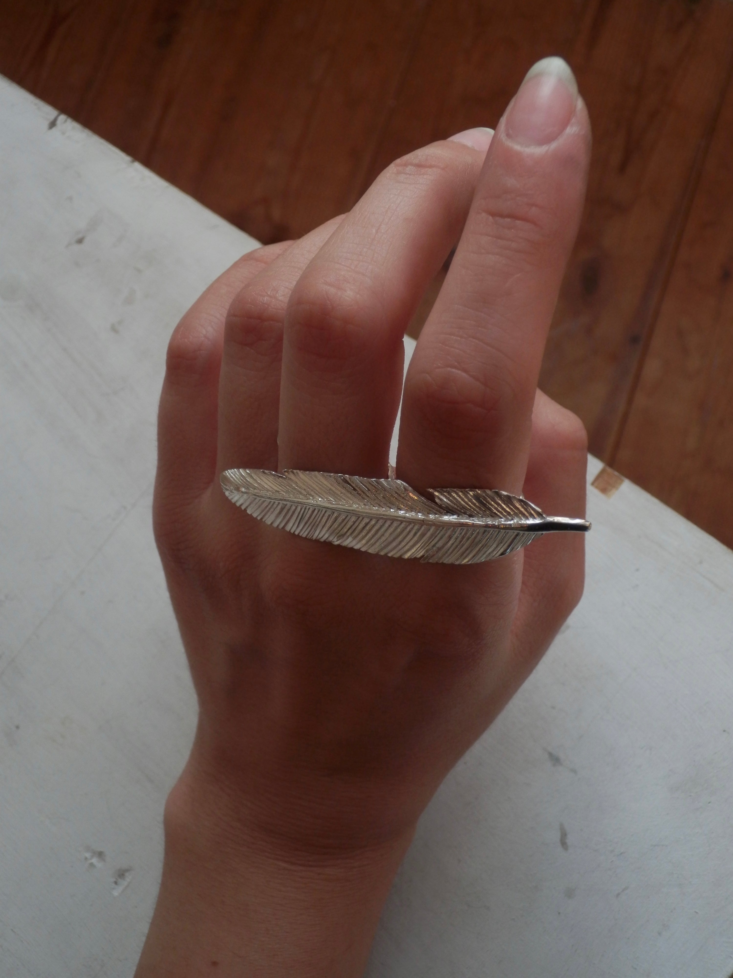 FEATHER REST