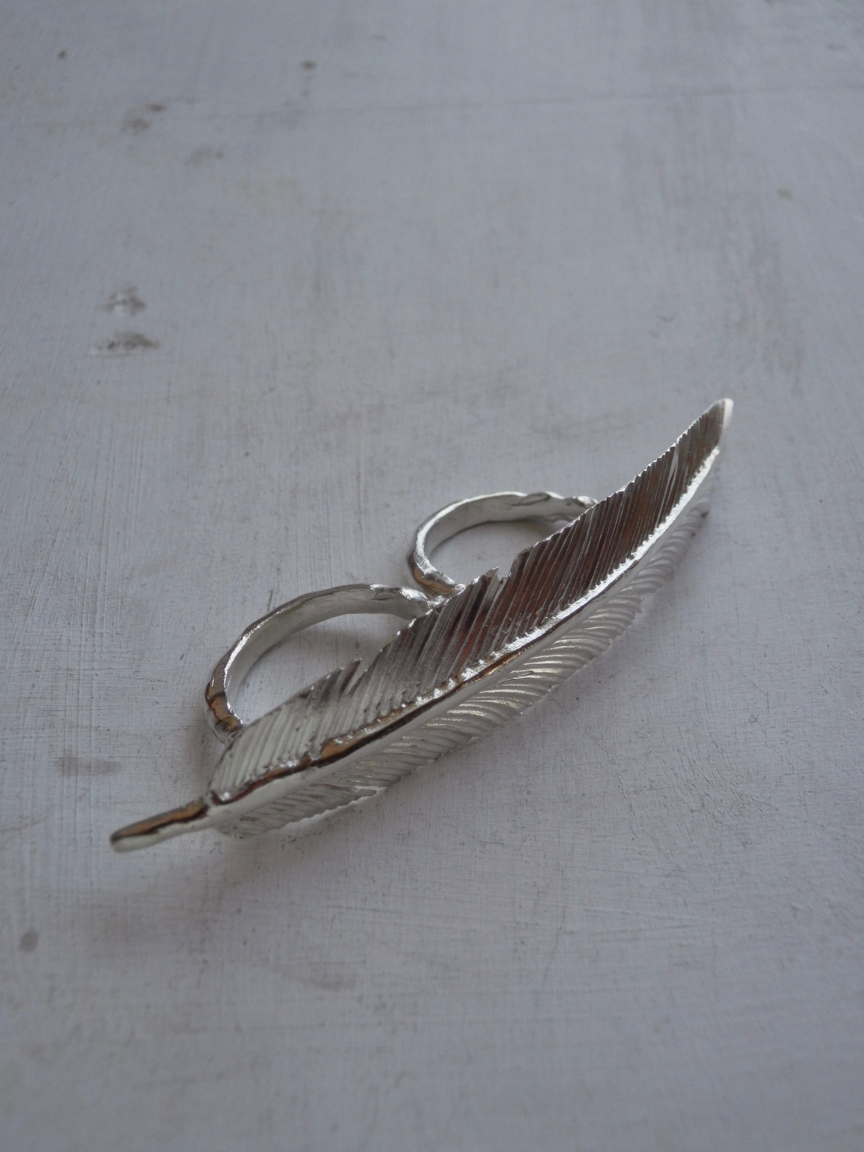 FEATHER REST •2