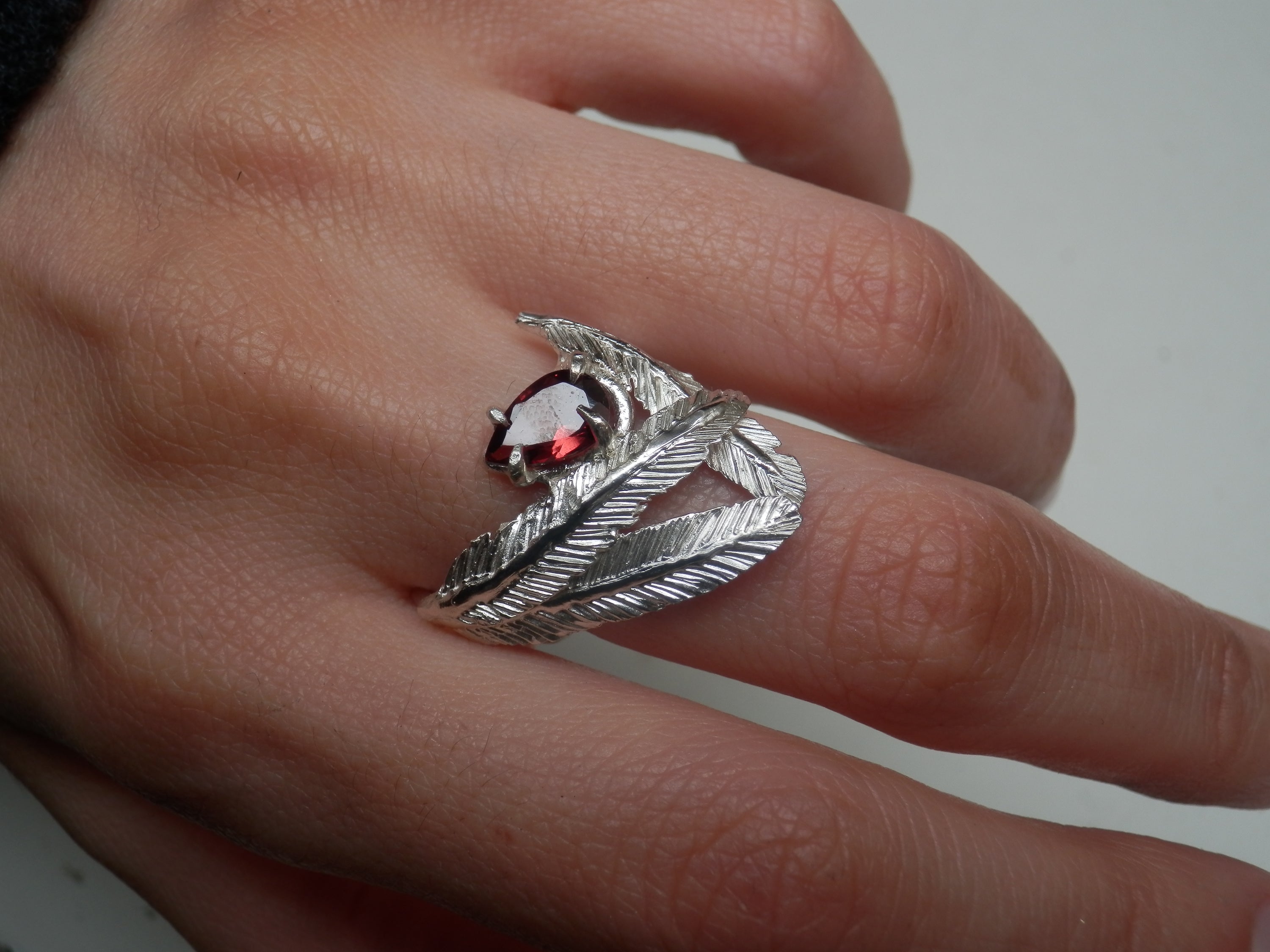 FEATHERS WITH A PETAL