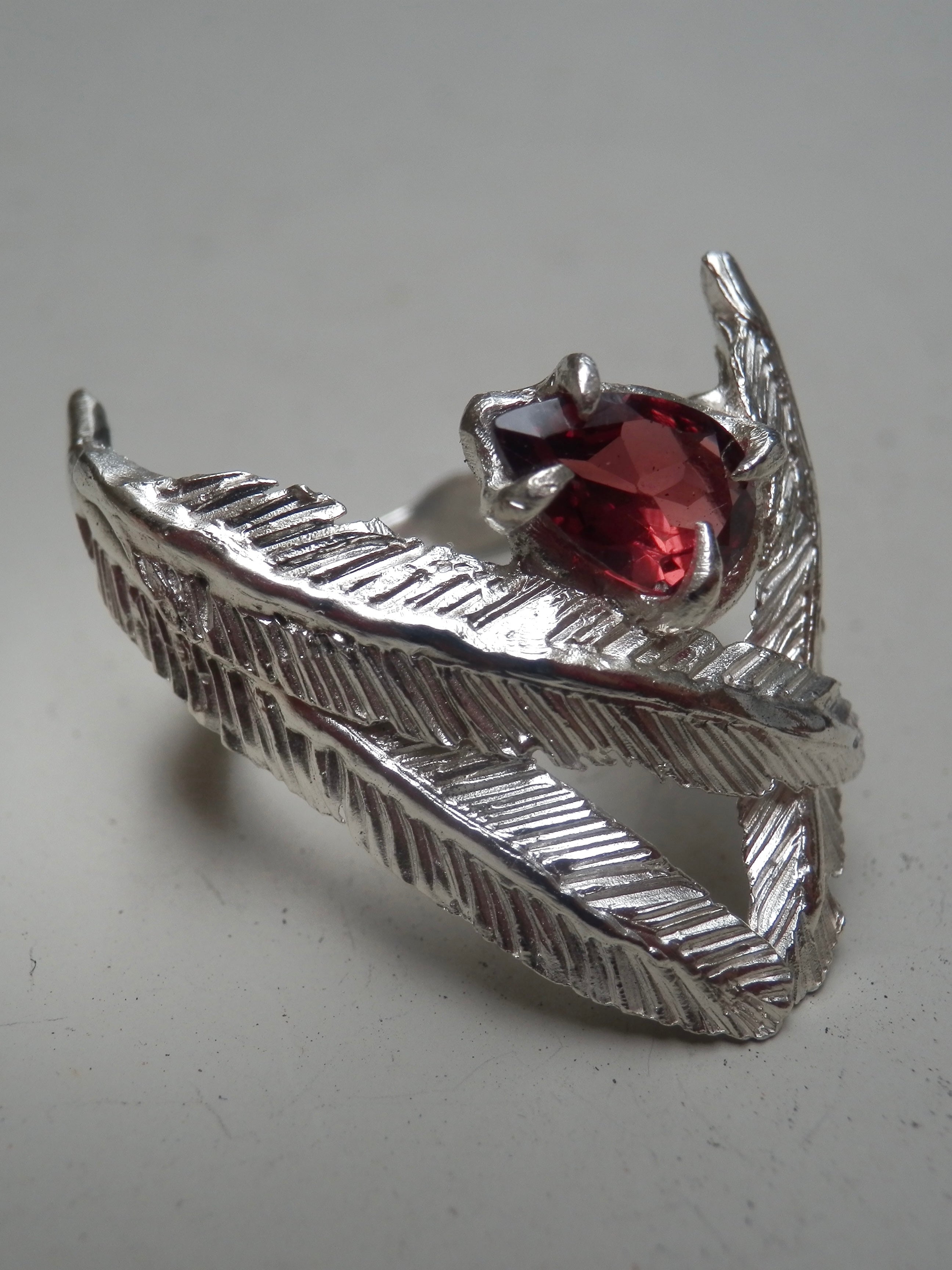 FEATHERS WITH A PETAL