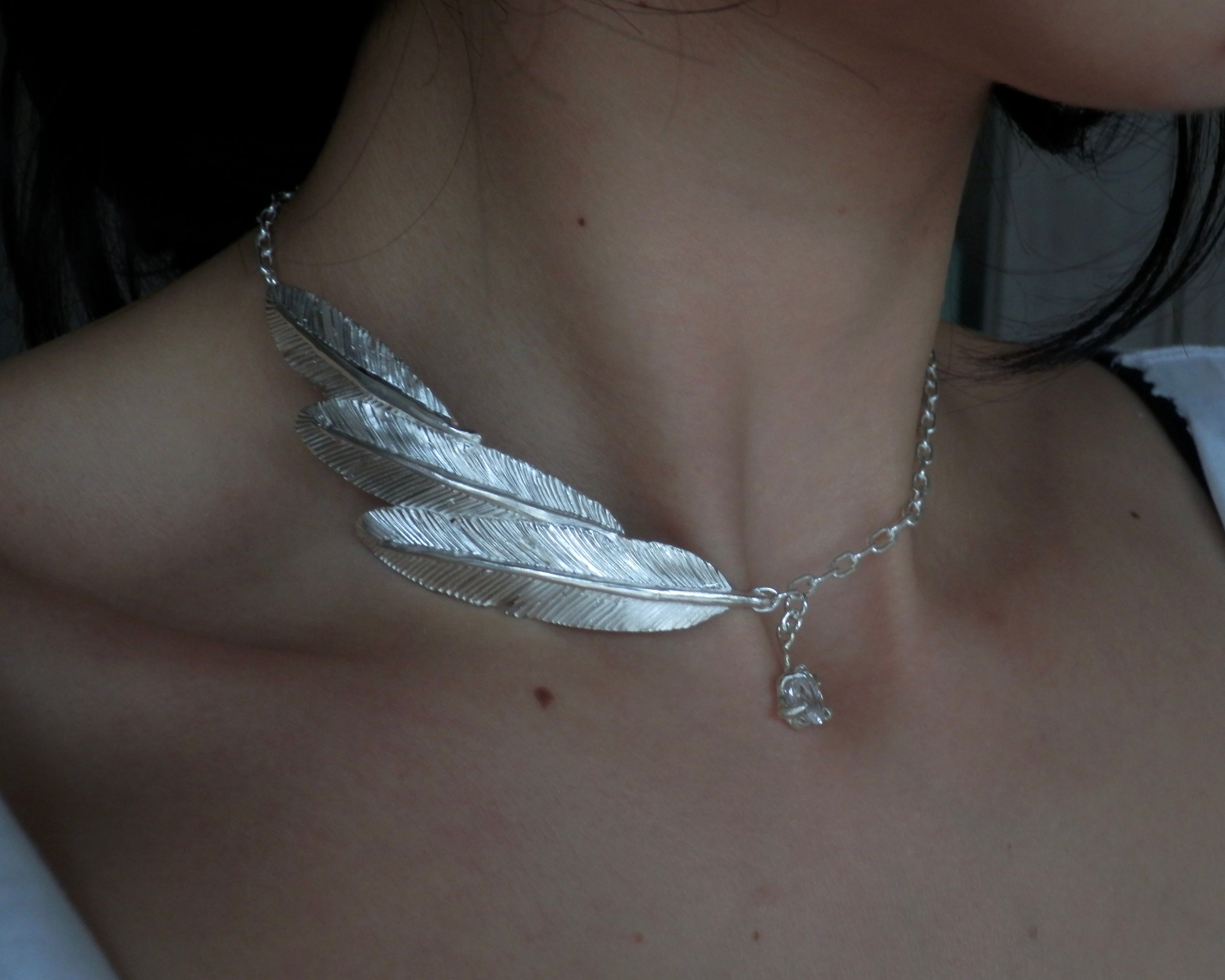 A HALF WING [1.1ct]