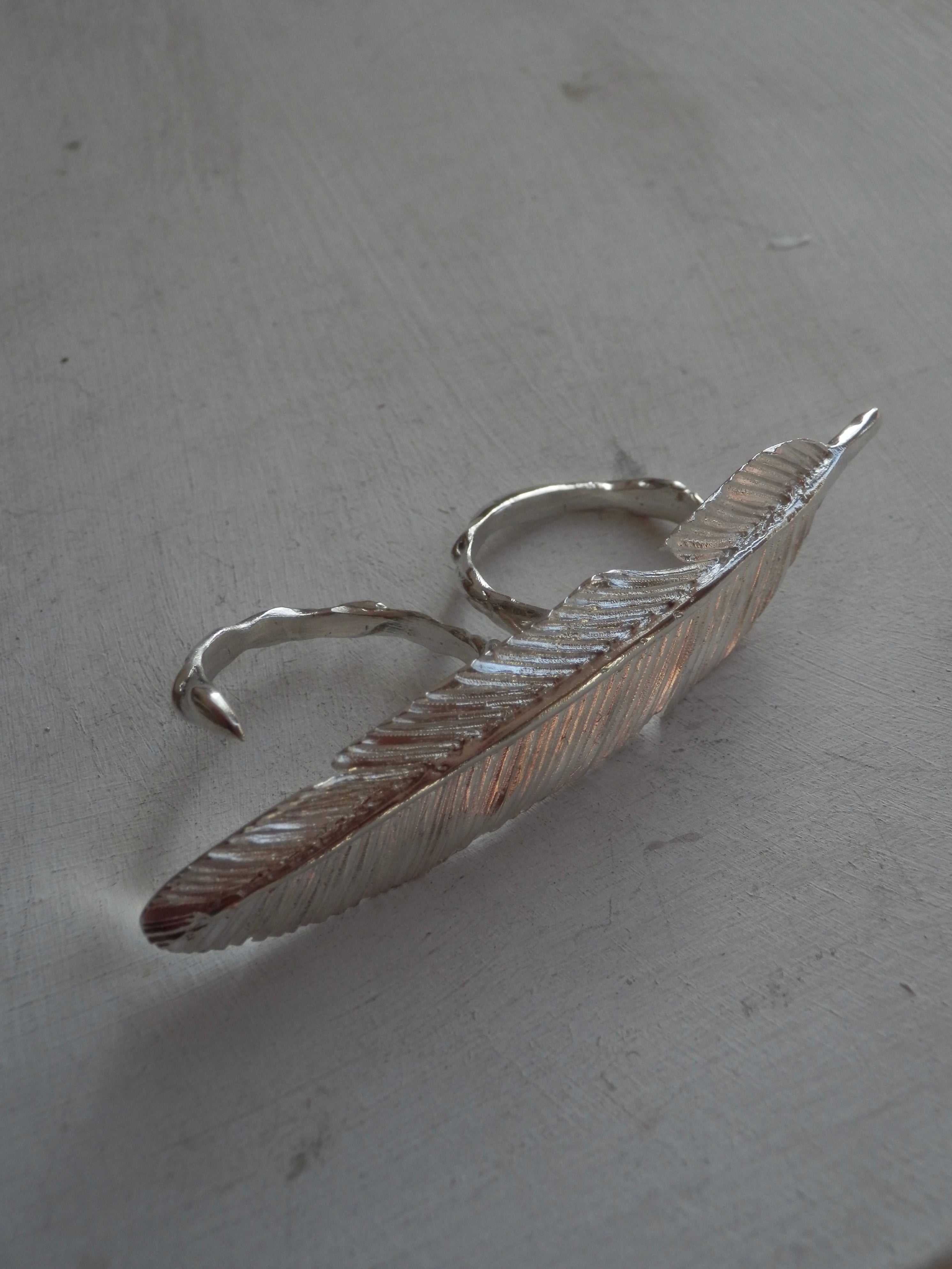 FEATHER REST